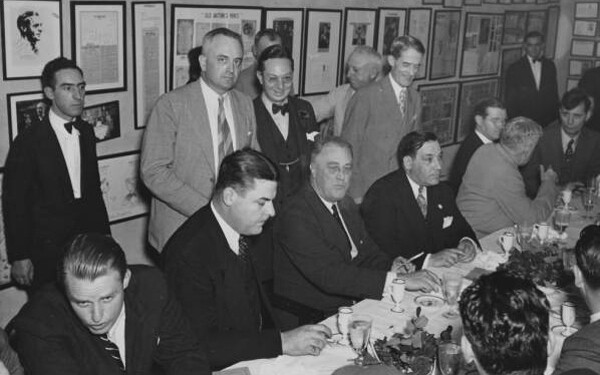 A group of WPA organizers plan the New Deal.