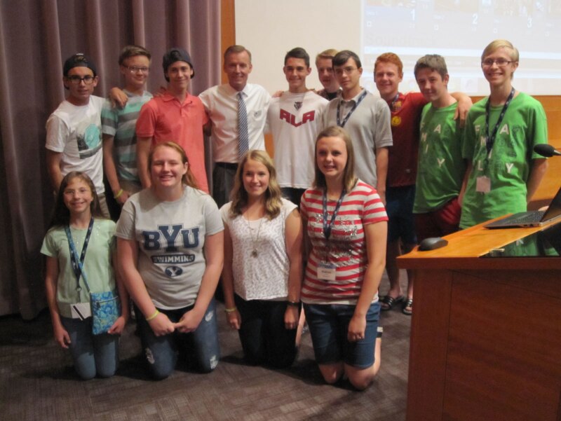 BYU myFamily History Youth Camp participants with John Bytheway
