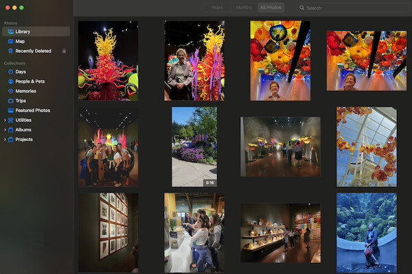 Photo gallery with colorful glass creations and aquarium visit.