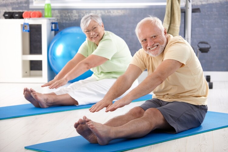 Old Couple Stretching--shutterstock_114143629