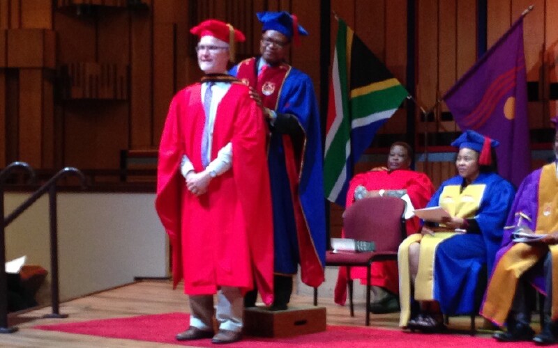 Lee Arnold receiving his doctorate degree