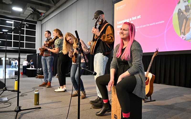 Performers at the 2024 RootsTech genealogy conference on the heritage stage.