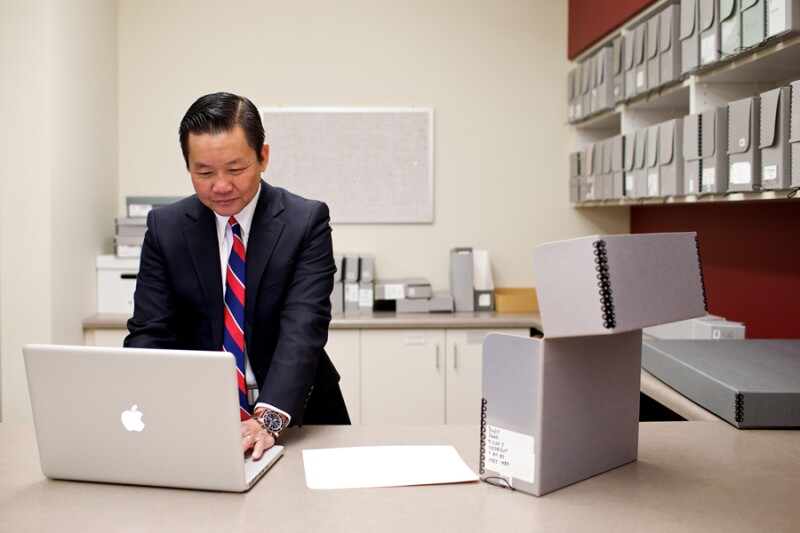 Archivist digitizing records.