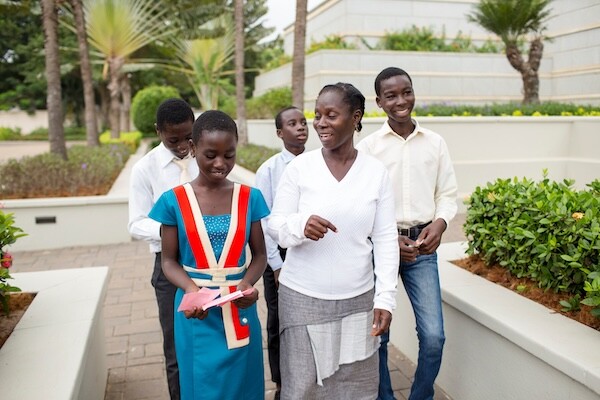 A family bringing family names to the temple in Africa