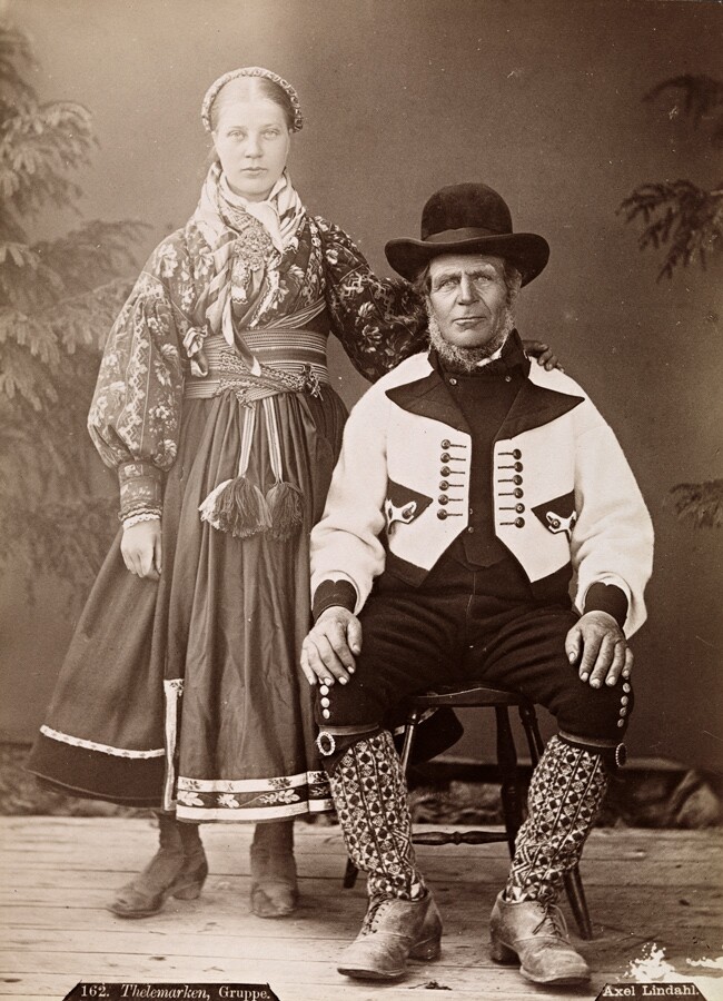 A pre-1900s photo of a couple from Telemark, Norway wearing bunads representing the region