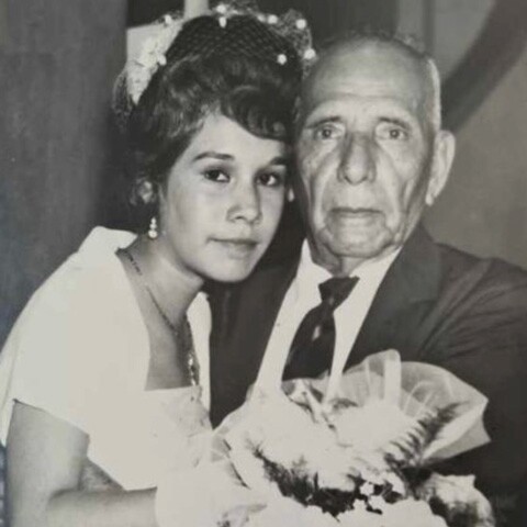 Serapio León with a relative, posing for a photo together.