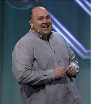 Ryan Parker, product manager of tree products at FamilySearch, speaks at the FamilySearch Global Forum during RootsTech 2025