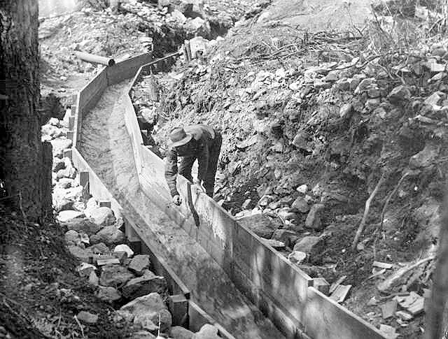 a man searches for gold during the california gold rush.