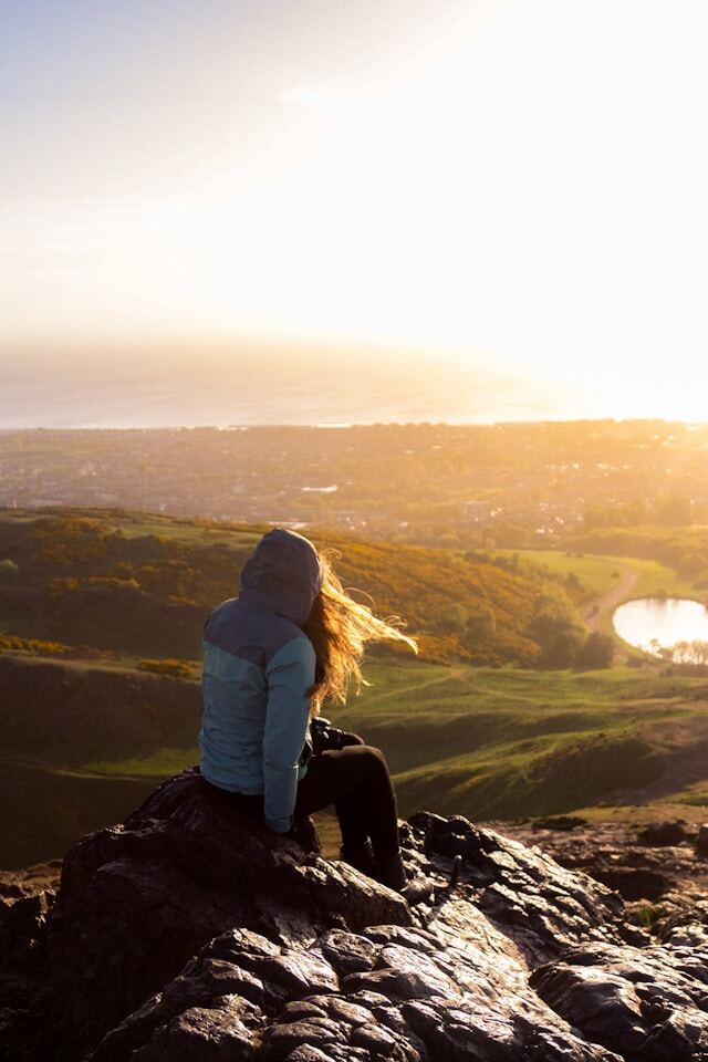 Girl on Arthur's Seat in Scotland