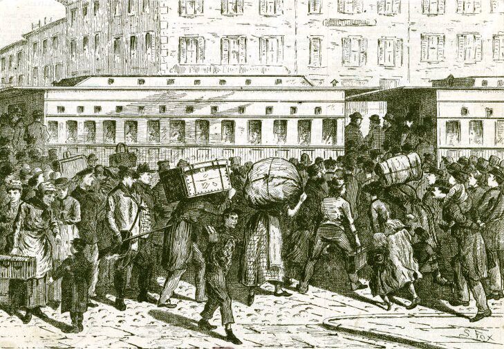 Immigrants on a busy dock, boarding a ship in about 1850.
