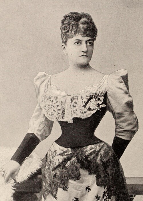 Woman dressed in a Spanish-style dress in the 1800s.