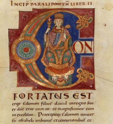 A sample page of illuminated text from an old Latin Bible.