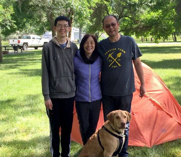 Christine Chiang camping with her husband, son, and dog, Snoopy.