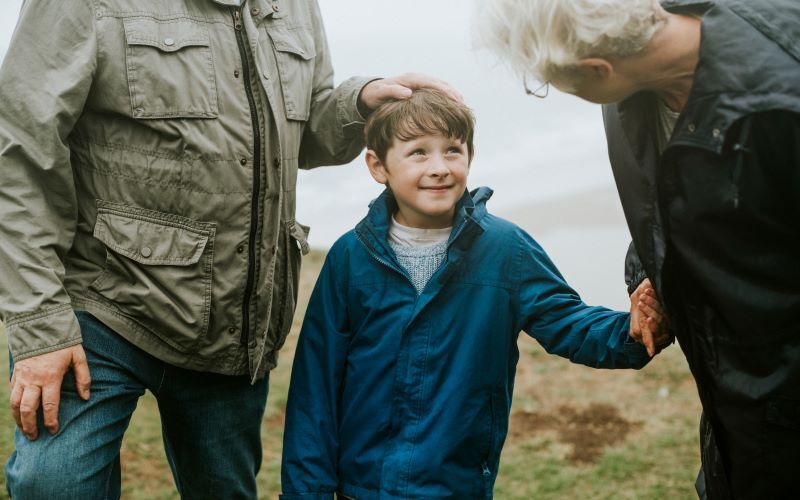 A little boy from Wales with his grandparents